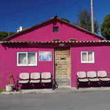 Mauve house with seats
