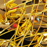Golden safety pins