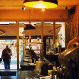 Café with customer, Luxembourg