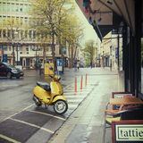 Parked yellow scooter