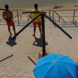 Lifeguards with blue umbrella, Cascais