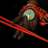 Red chopsticks with green peacock