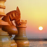 Chess pieces on a calm sea