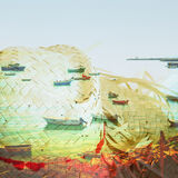 Straw hat and fishing boats