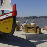 Tourists with painted boat