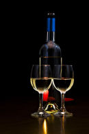 Wine glasses with red candle