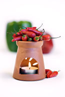 Hot chillies with candle