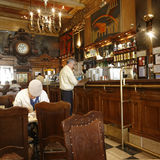 Man with cloth cap in Cafe, Lisbon