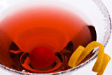 Red drink with orange peel