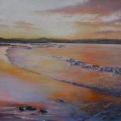 Sunset Over Sand and Sea