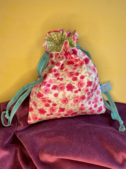 Rosebud print drawstring bag