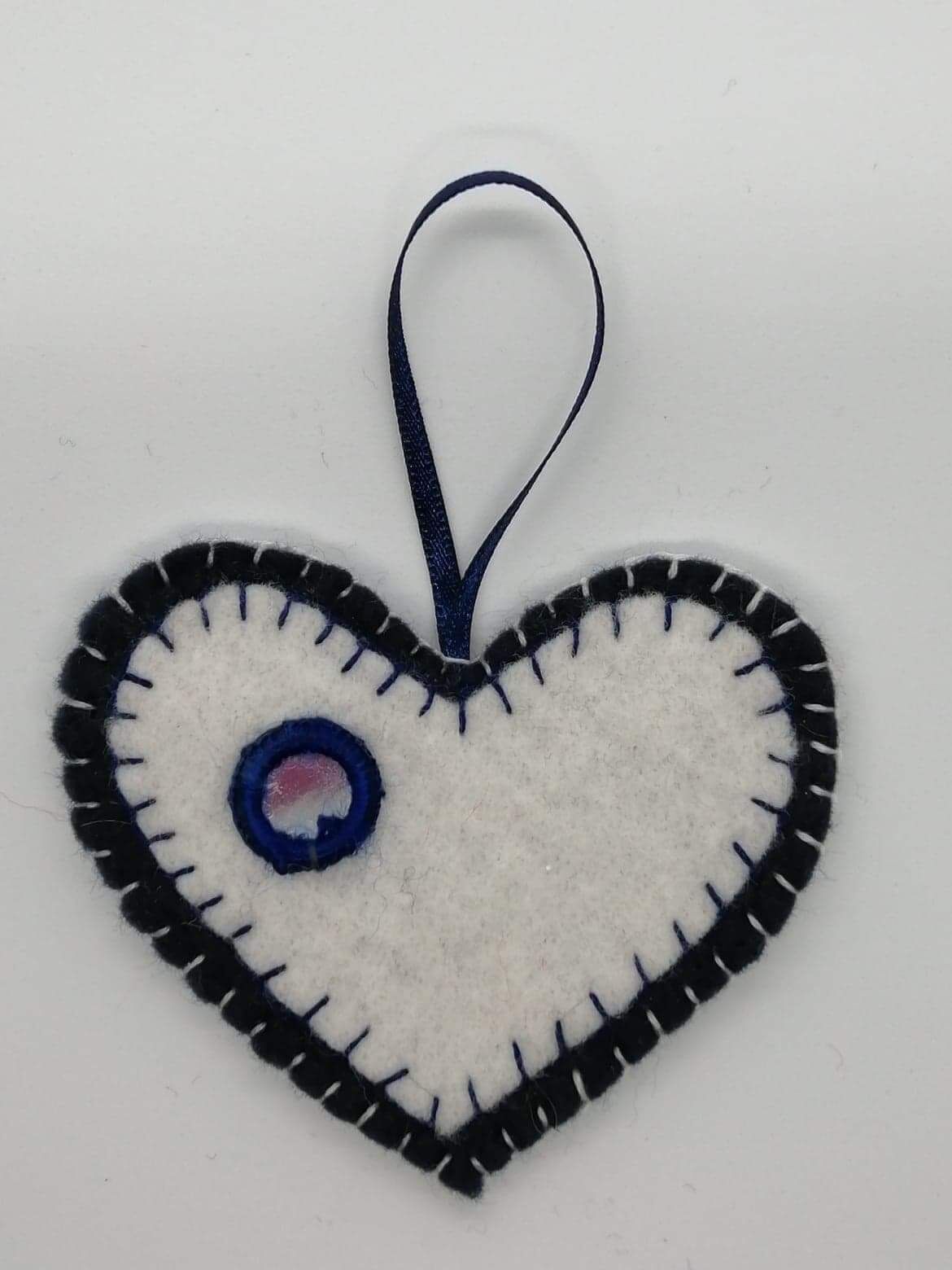 White hanging heart