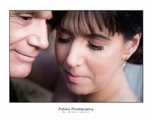 Cullen-Bay-Hotel-Wedding-Photography-09 Bride & Groom holding in a romantic pose. Natural light.