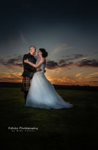 Cullen-Bay-Hotel-Wedding-Photography-11 Sunset photograph of the bride and groom.