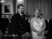 Fife-Lodge-Banff-Wedding-Photography-01 Wedding photographs of the bride and groom standing at the altar. By Aberdeenshire wedding photographer Fitlike Photography.