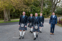 Fife-Lodge-Banff-Wedding-Photography-04 Wedding photograph of the groom and groomsmen walking towards the camera in natural light. Taken by Aberdeenshire Wedding Photographer Fitlike Photography