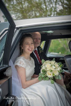 Glen-Mhor-Hotel-Inverness-Wedding-Photography-002 Bride and Father of the Bride in the wedding car.