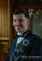 Glen-Mhor-Hotel-Inverness-Wedding-Photography-003 Groom posed in natural light at the chapel.