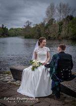 Glen-Mhor-Hotel-Inverness-Wedding-Photography-009 Bride and Groom posed naturally in natural light.