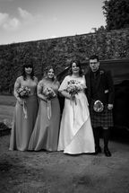 Gordon-Castle-Moray-Wedding-Photography-01 The bride with her bridesmaids (also her daughters) and son just before the wedding ceremony