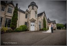 Kingsmills-Hotel-Inverness-Wedding-Photographers-02 Inverness Wedding Photographers at the Kingsmill Hotel, Inverness. A wedding photograph of the bride and groom outside the hotel.