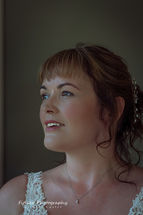 Logie-Country-House-Wedding-Photography-002 The bride looking out of the window. Lit with natural light.