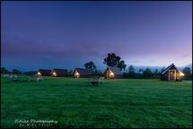 Moray-Business-Branding-Photographers A commercial and branding photography of MacBeth's Hillock Glamping near Brodie, Forres, Moray. A photography of the glamping pods taken at twilight with the outdoor lighting on.