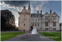 Moray-Wedding-Photography-01 The bride and groom posed at the front of Brodie castle, Moray. They were lit from the front with off camera flash.