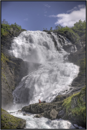 Lady at the waterfall