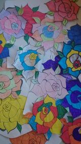 Women made their own project with paper flowers and sent them to David Cameron asking him to  change policy and protect women from violence and exploitation