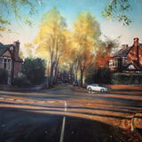 Low sun on a silver car