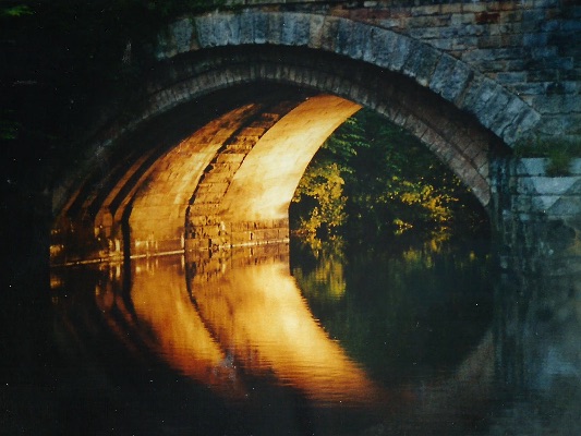 Sunset bridge reflection