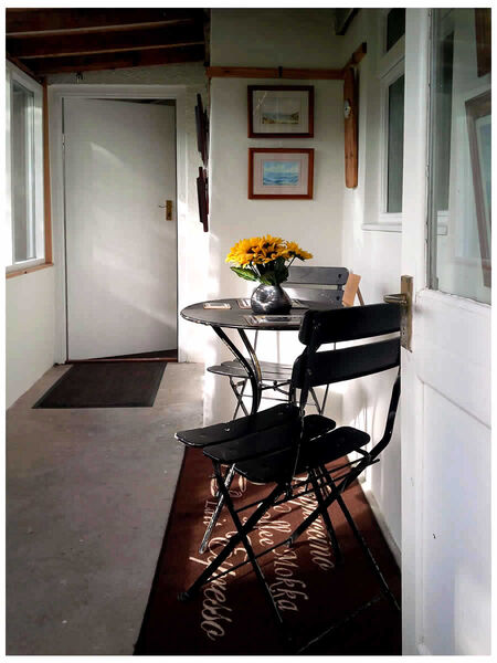 Sunroom Inside Towards Kitchen and Storeroom