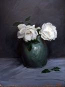 Winter rose in green vase