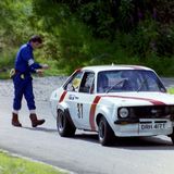 HILL CLIMB - Fintray 24 June, 1990 (The marshall sends an errant driver on his way after a close inspection of the banking at Ruin Corner)