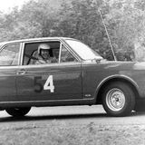 HILL CLIMB - Fintray 24 September, 1967, Bob Haining (Ford Cortina Lotus) Grinning as he negotiates the Hairpin