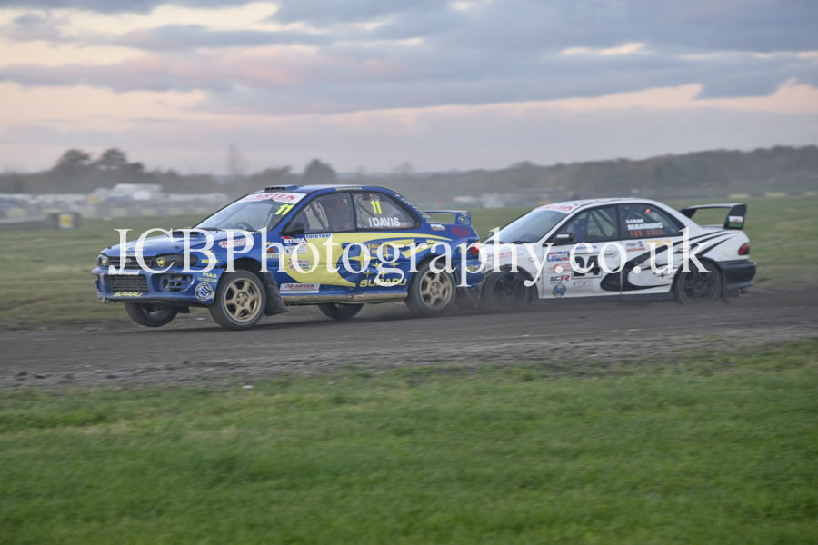 Subaru Impreza driven by Paul Davis battles with a similar car of Liam Manning