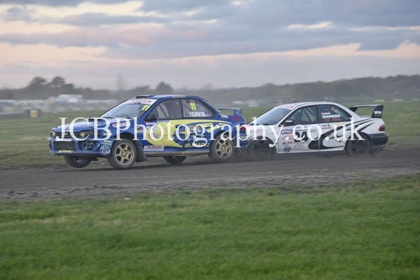 Subaru Impreza driven by Paul Davis battles with a similar car of Liam Manning