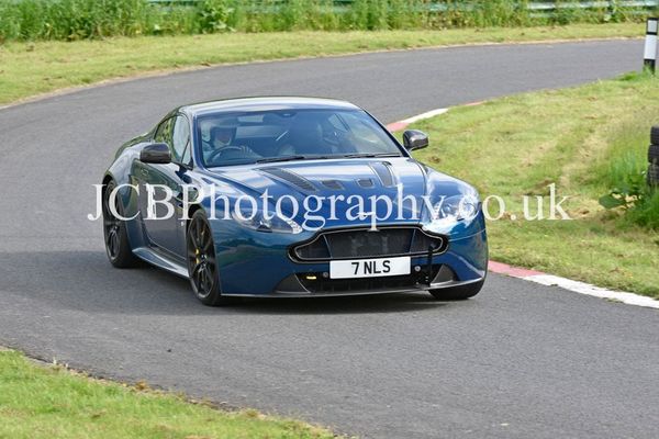 Aston Martin V12 Vantage driven by Neil Sims