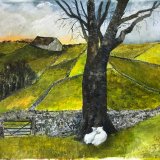 Young lambs at foot of tree