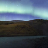 Aurora arc over Skogafoss