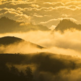 Sunset clouds around the rim of Rinjani