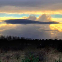 EVENING LIGHT: Letterbox style suits the image. Interesting clouds with dark but visible foreground emphasising the variations in light.