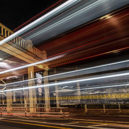 LIGHT TRAILS: Completely different use of light. Grabs the attention and holds it even if sign catches eye. Lovely colour, well exposed and an ordinary scene lifted in interest.
