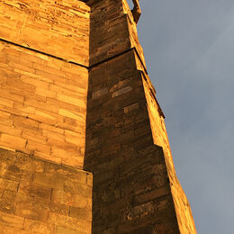 LUMLEY CASTLE TURRET: Turret well lit by the sun giving the stones that golden glow. Sharp throughout and eyes drawn upwards.