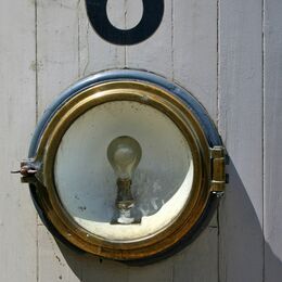 NO 6: And a light too! Well lit and well seen. Circle surrounding the bulb matches the circle of the number 6. It all fits together. Nit pick – perhaps take out wee shadow top right.