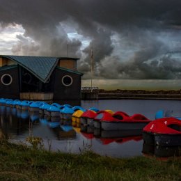 Stormy boating pond