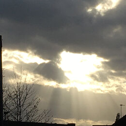 SUNBURST: Skies like this always attract but the eye can compensate for light variation. Here have the rays but also light source is burnt out and car and tv aerial distract.