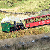 Snowdon Mountain Railway steaming past Dinorwic