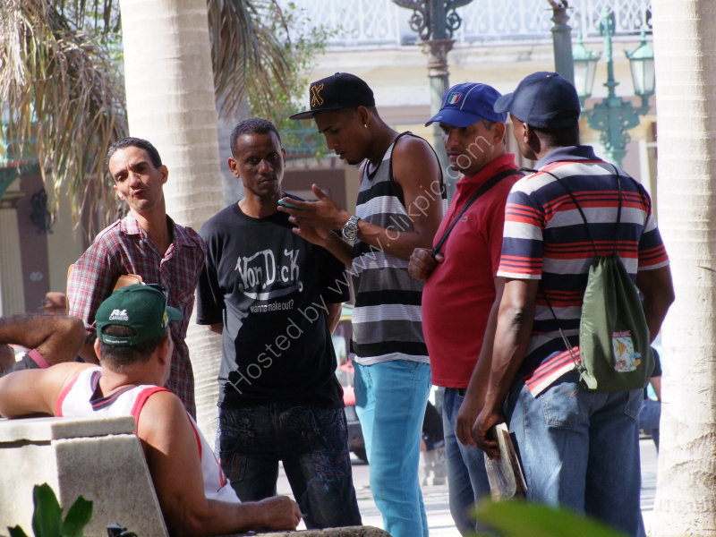 Cubans discussing Baseball, Parque Central, Havana